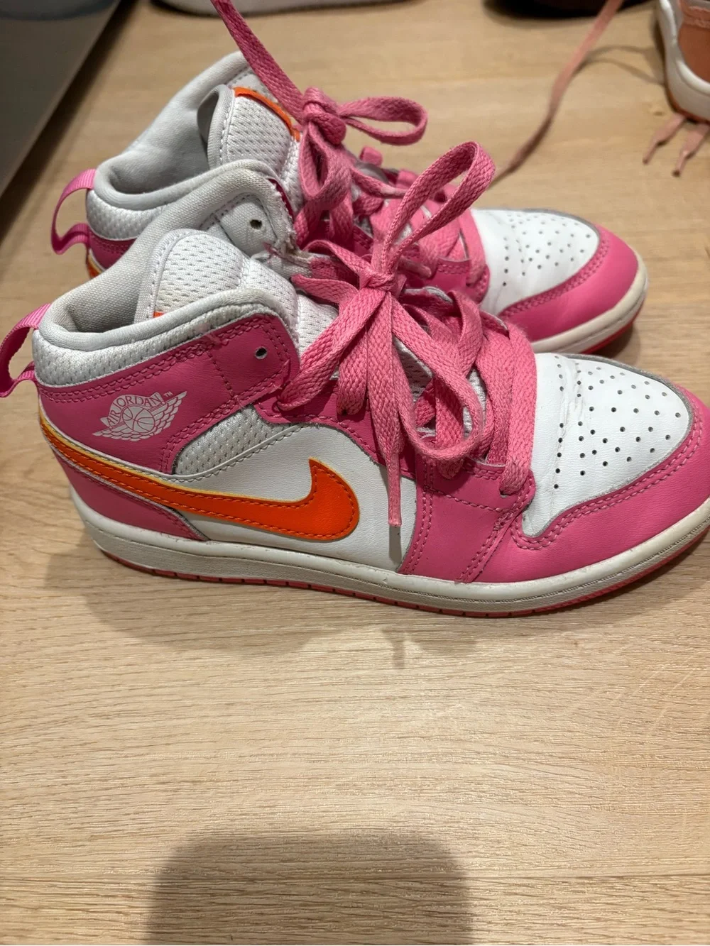 Nike Kids Pink and White High-Top Sneakers with Orange Logo